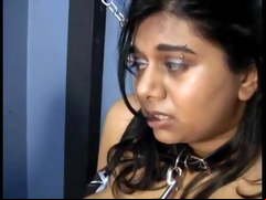 Indian slave serving her mistress as a good slave